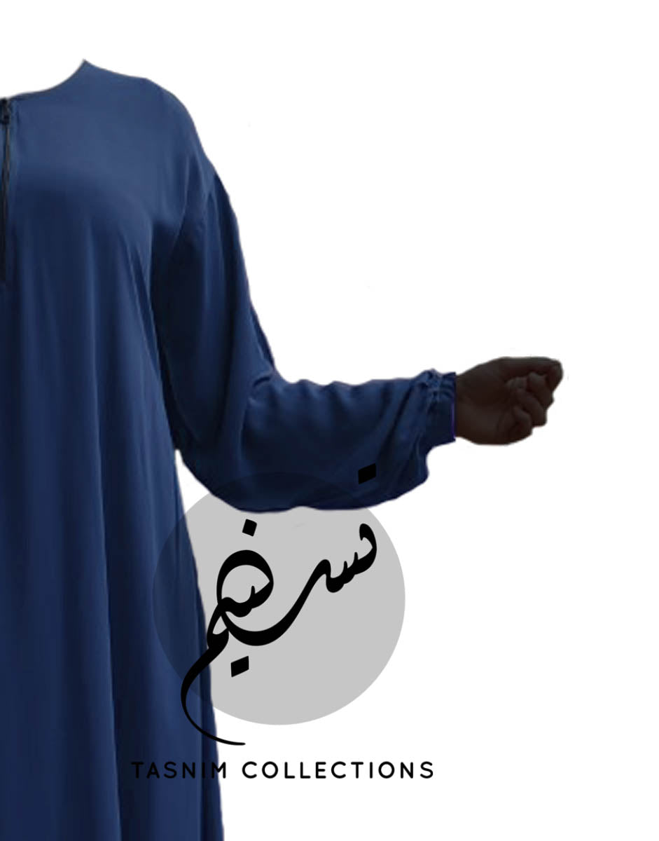A woman with left arm stretched wearing  2 Piece Abaya Sarah with Pockets  - Tasnim Collections